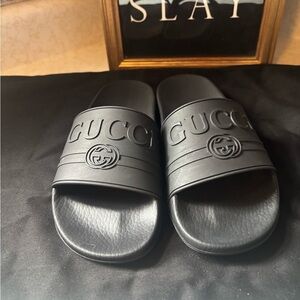 Gucci Black Embossed Logo Slide Sandals